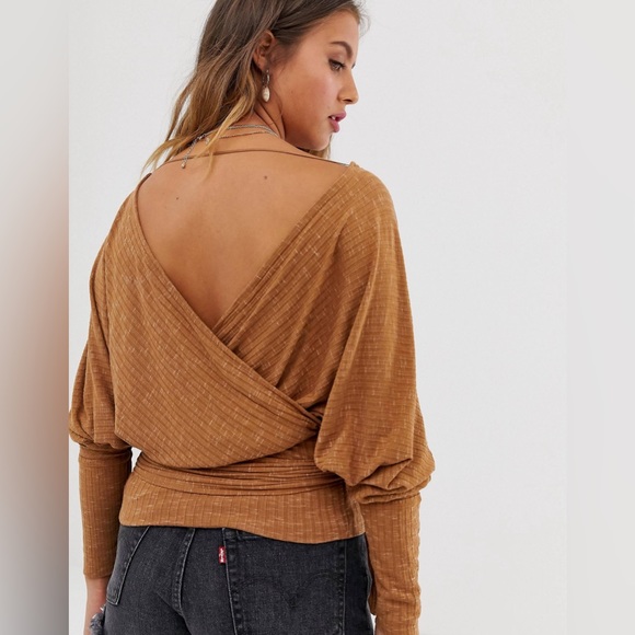 Free People East Coast Copper Long Sleeve Wrap Top
Size Small - Picture 2 of 7